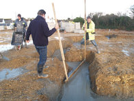 People digging and laying foundation at Roseland