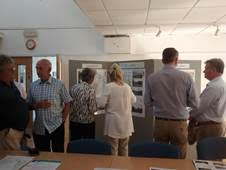 People looking information boards at the Roseland consultation