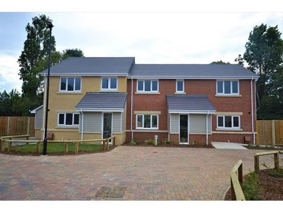 Two houses on Sycamore Drive