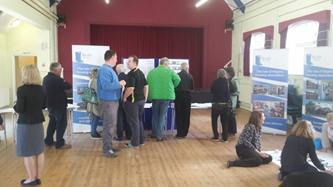 A group of people at the Sycamore Drive meeting